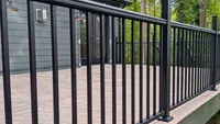 A close-up view of premium black aluminum deck railings installed on a custom composite deck for a residential home in Davidsonville.
