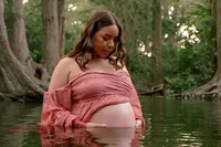 Cradling the Baby Bump in Creek Water.