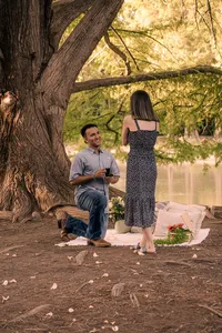 Man proposing to his wife.