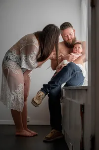 A Mother Kisses Her Newborn’s Tiny Foot.