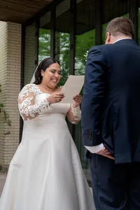 Reading Wedding Vows with a Smile.