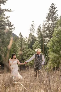 Holding Hands Among the Pine Trees.