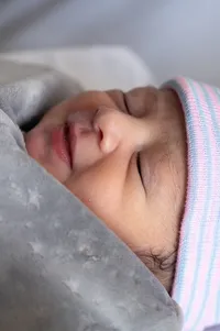 Close-up of a newborn face.
