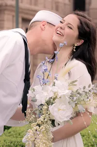 A Wedding Day Laugh with a Wildflower Bouquet.