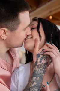 Close-up of a couple kissing.