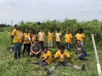 Copy of The combined crew after a day working on the rice paddies