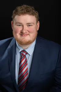 Professional Headshot in a Navy Suit