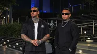 Safar Bros wearing sunglasses and black outfits together at night