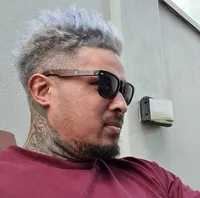 The Real DBFS wearing sunglasses in side profile