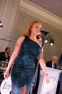 Legacy Band female vocalist performing live at a private event