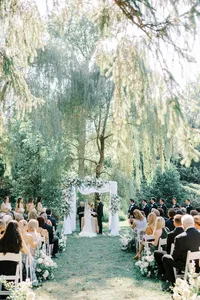 Outdoor wedding ceremony at Appleford Estate surrounded by greenery
