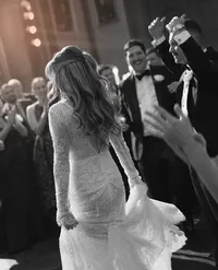 Black and white photograph of bride during reception introductions