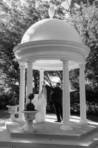 Elegant wedding venue entrance with white columns