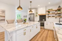 Bright Farmhouse Kitchen with Gray Mug Shelves