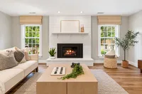 Symmetrical Scandinavian Living Room with Fireplace