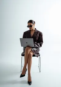 45_with-laptop-sitting-chair