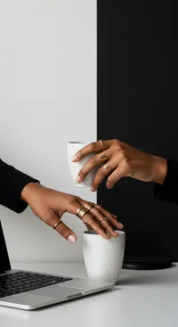 102_person-typing-with-coffee