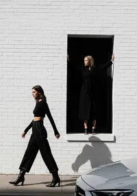 41_walking-past-white-wall