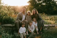 krista5123_A_family_arranged_organically_across_the_steps_and_b2b11465-70d3-4c4b-bd5f-62fb7335745c_0