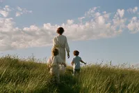 krista5123_Mother_and_two_children_walking_along_the_edge_of__4e94851e-fee2-456e-9951-b03be3c92f2a_1