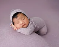 Newborn baby sleeping in a posed studio portrait, Palm Springs newborn photography