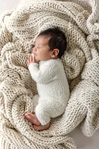 Newborn baby from the Vielmas family during a lifestyle newborn session
