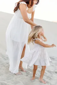 Woman in white posed in motion during a Palm Springs photography session