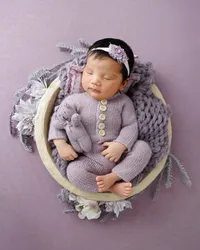 Newborn baby styled with props during a La Quinta studio session