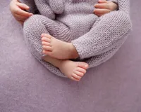 Detail shot of newborn baby's feet during a studio newborn session