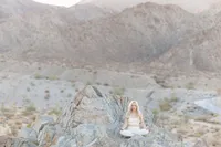 Celeste photographed outdoors with mountain views during a La Quinta branding session