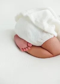 Detail shot of newborn baby's feet during a studio newborn session