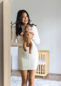 Candid portrait of newborn baby Kai during a lifestyle newborn session
