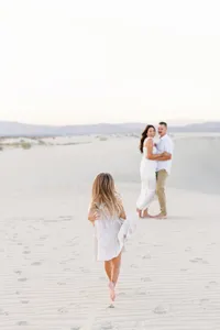 Family walking along the beach during a Palm Springs photography session