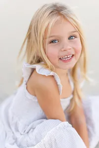 Little girl smiling in the dunes of Palm Springs