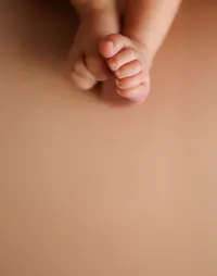 Detail shot of newborn baby's feet during a studio newborn session