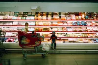 A boy dresses in spiderman to go shopping at an heb in conroe texas