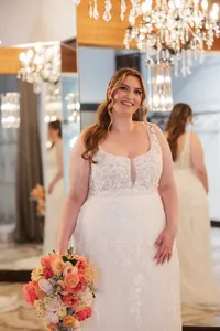 Bride in her wedding gown after bridal makeup by Minneapolis wedding makeup artist Alexa Navis