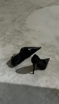 black-pointed-toe-heels-floor