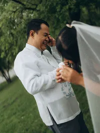 Michigan wedding photography of a father crying as he sees his daughter in her wedding dress.