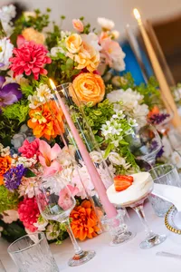 colourful floral wedding table with candles