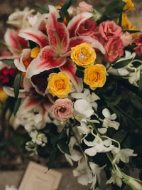 Michigan wedding photographer Grace Wan captures the bride's wedding ring resting on a flower in her bouquet.