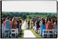35mm film wedding photography of a bride and groom during their wedding ceremony in Michigan.