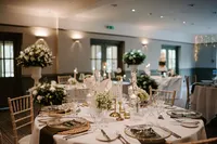 Yorkshire wedding reception table styling with white florals