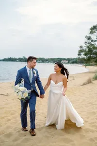 Newlyweds enjoy a private shoreline for wedding portraits at Chesapeake Bay Foundation Weddings and Events