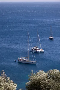 processed_Corfu Dreams - Sailboats anchored in pristine Mediterranean waters - TVS