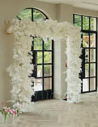 white square wedding floral arch inside wedding venue