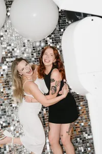 glitz-sequin-backdrop-friends-hug