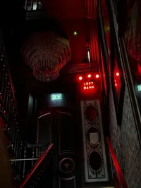 left-bank-neon-sign-staircase-venue