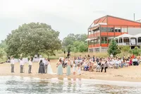 A wedding reception on the shores of the Chesapeake Bay in front of the Philip Merrill Environmental Center