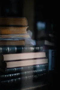 stack of vintage ornate books